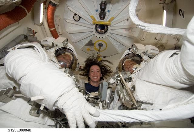 NASA image: STS-125 Crew Members pose for a photo prior to EVA5