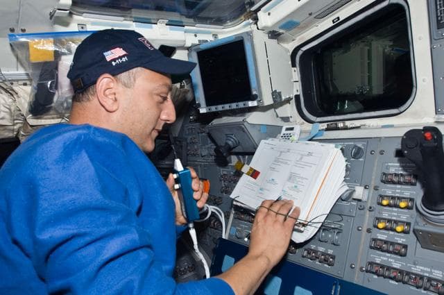 NASA image: STS-125 MS4 Massimino works on the Flight Deck during Flight Day 8