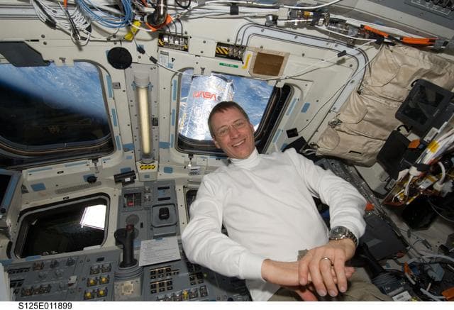 NASA image: View of STS-125 Pilot Gregory C. Johnson on the Flight Deck