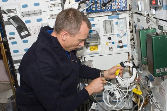 NASA image: View of MS Andrew Feustel working on the Middeck