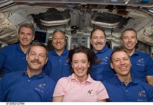 NASA image: The STS-125 Crew poses for a portrait on the Flight Deck
