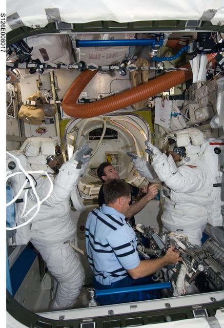 NASA image: Bowen, Ferguson, Chamitoff and Stefanyshyn-Piper in A/L