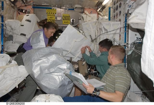 NASA image: Stefanyshyn-Piper, Kimbrough and Boe in Node 1