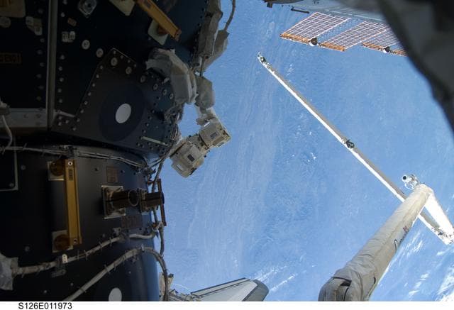 NASA image: PMA-2 and SRMS/OBSS during Expedition 18 / STS-126 Joint Operations