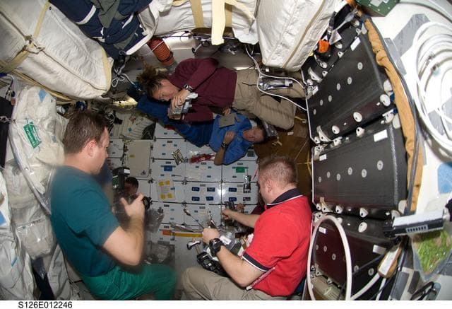 NASA image: Crewmembers Share Thanksgiving Meal on MDDK