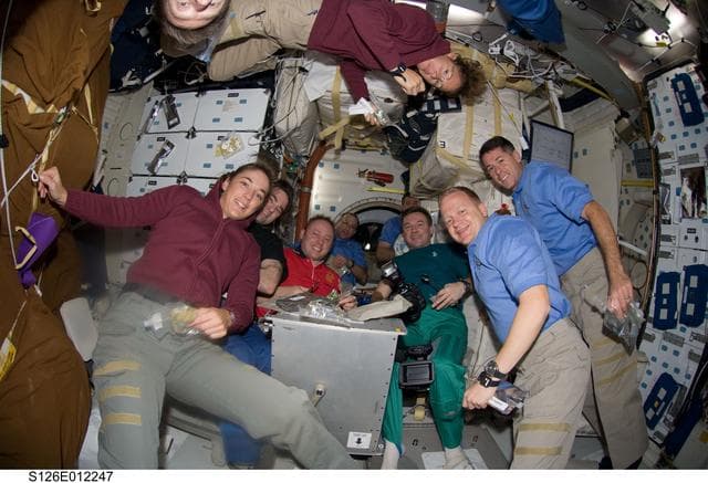 NASA image: Crewmembers Share Thanksgiving Meal on MDDK