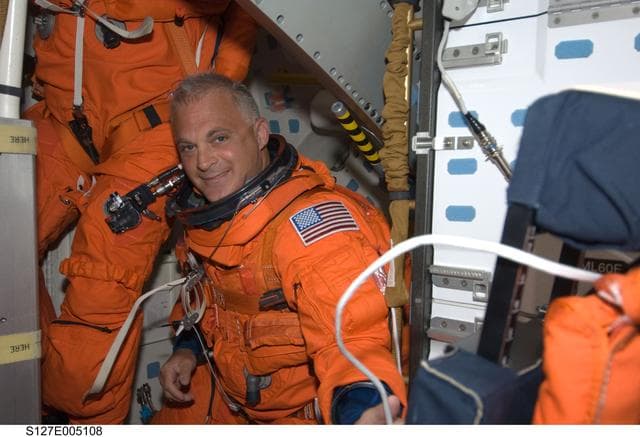 NASA image: Wolf wears LES in the FWD MDDK of Space Shuttle Endeavor during STS-127 Mission