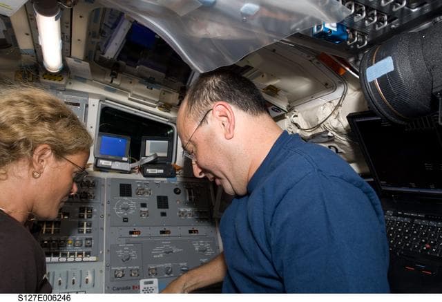 NASA image: Payette and Polansky work in the aft FD on Space Shuttle Endeavour during the STS-127 Mission