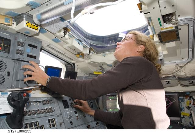 NASA image: Payette uses the SRMS in the aft FD on Space Shuttle Endeavour during the STS-127 Mission