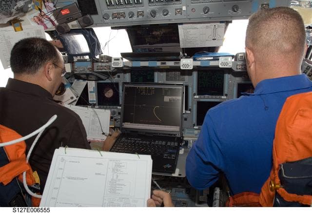 NASA image: Polanksy and Hurley in the FWD FD on Space Shuttle Endeavour during STS-127 Mission