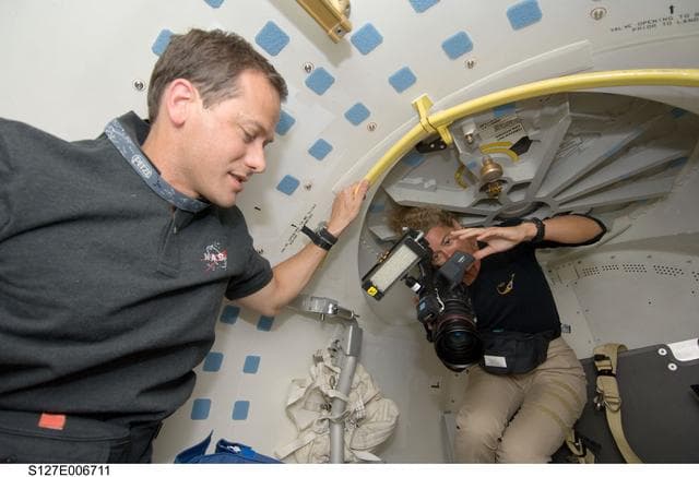 NASA image: Marshburn and Payette in the A/L during STS-127 Mission