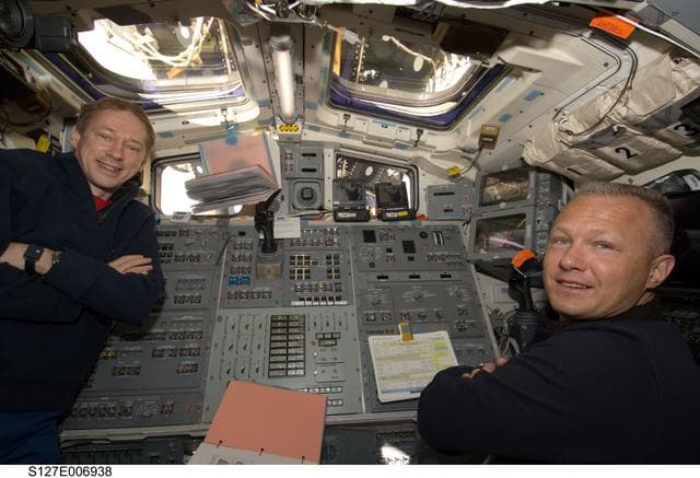 NASA image: De Winne and Hurley in the aft FD during STS-127 / Expedition 20 Joint Operations
