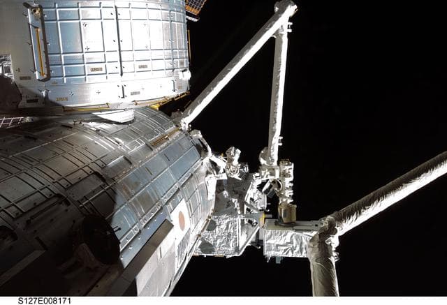 NASA image: Kibo arm unberths ICS Payload during Joint Operations