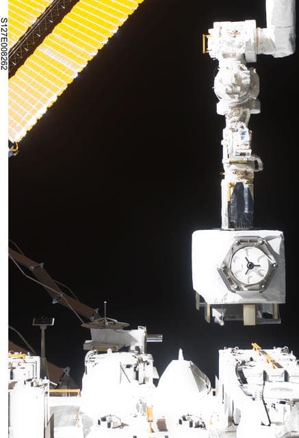 NASA image: Kibo Arm installs JAXA SEDA-AP onto the Japanese EFU during STS-127 Mission