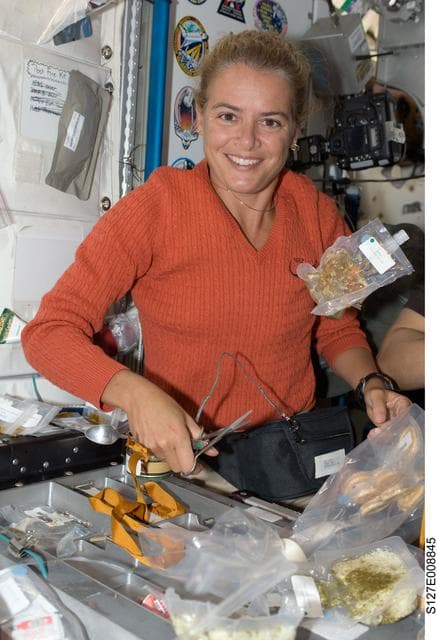 NASA image: Payette enjoys meal in the Node 1 during Joint Operations