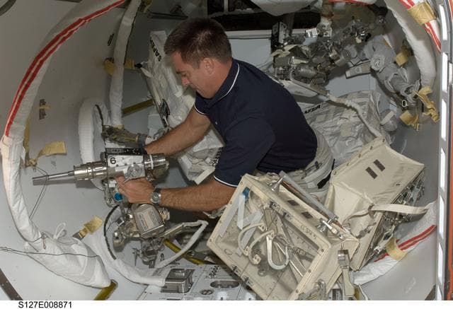 NASA image: Cassidy works with EVA Tools in the A/L during Joint Operations