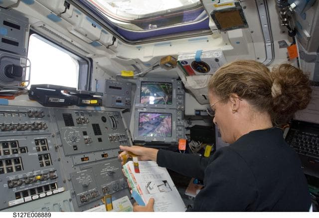 NASA image: Payette at the SRMS in the aft FD of Endeavour during Joint Operations