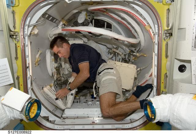 NASA image: Cassidy works in the A/L during Joint Operations