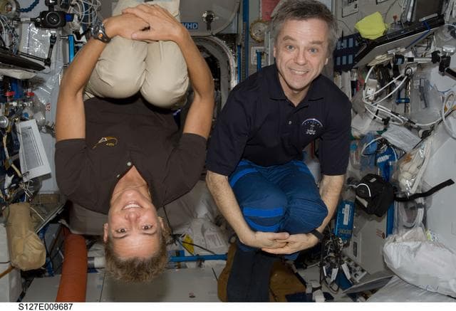NASA image: Payette and Thirsk pose in the European Columbus Module