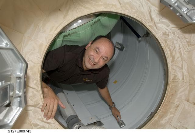 NASA image: Polansky and Wakata in the PMA-2 during Joint Operations