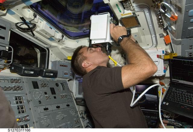 NASA image: Cassidy uses laser range finder in the aft FD during Joint Operations