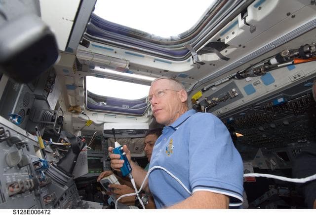 NASA image: Forrester and Hernandez on Flight Deck (FD) during OBSS OPS
