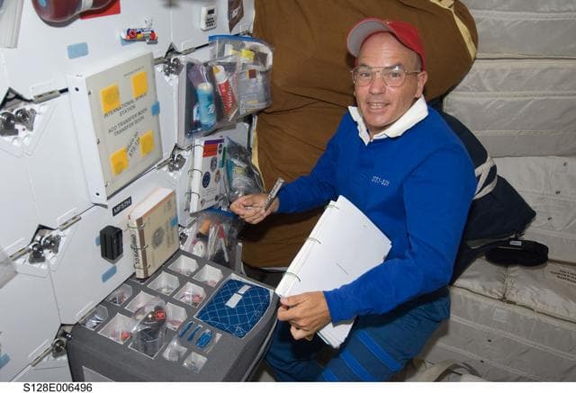 NASA image: Sturckow with stowage on Middeck (MDDK)