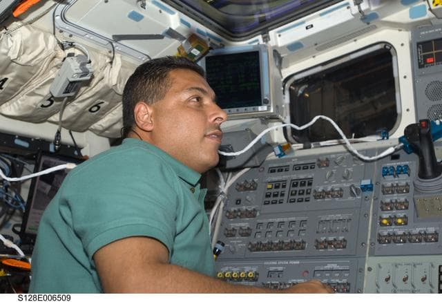 NASA image: Hernandez on AFT Flight Deck (FD) during OBSS OPS