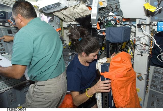 NASA image: Hernandez on Flight Deck (FD) during OBSS OPS