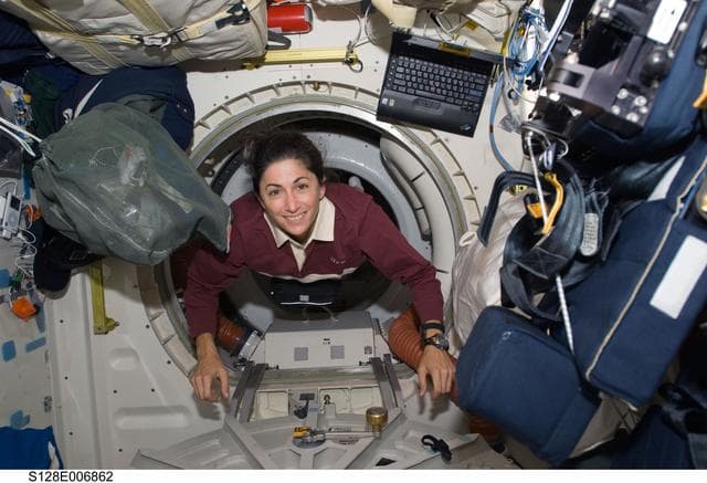 NASA image: Stott in Shuttle Airlock