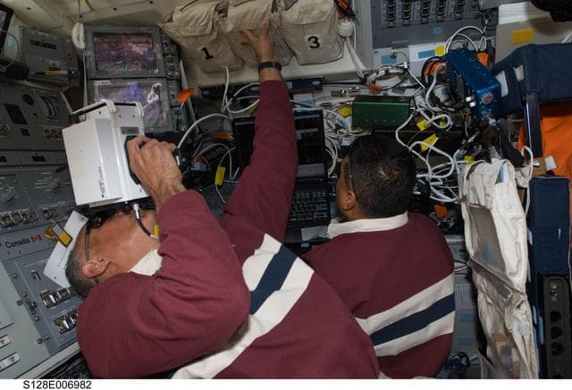NASA image: Hernandez on Flight Deck during Approach OPS