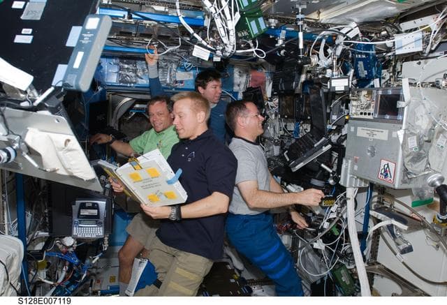 NASA image: Multi- Purpose Logistics Module (MPLM) Unberth to Installation from Robotics Workstation (RWS)