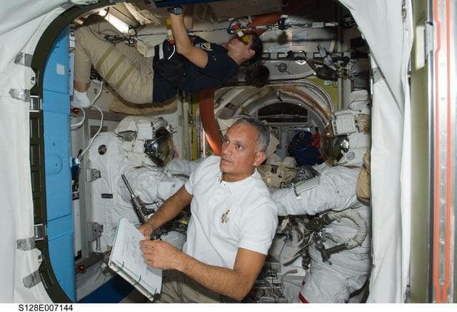 NASA image: Extravehicular Mobility Unit (EMU) Prep in Joint Airlock