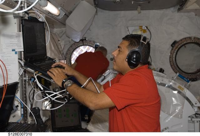NASA image: Hernandez at laptop in Japanese Experiment Module (JEM)