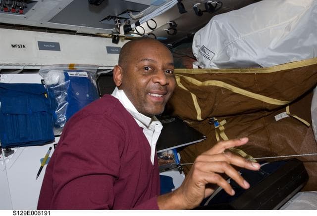 NASA image: STS-129 MS Satcher poses for a photo on the MDDK