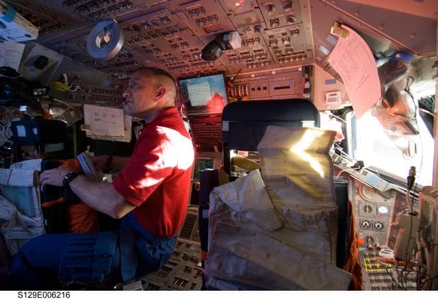 NASA image: STS-129 CDR Hobaugh works on the FD
