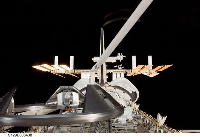 NASA image: Exterior view of Atlantis and ISS as seen through an aft Flight Deck Window during Rendezvous Operations
