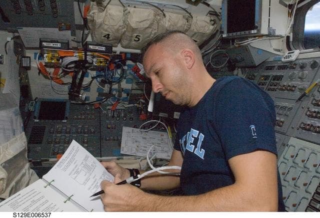 NASA image: View of MS4 Satcher working on the FD