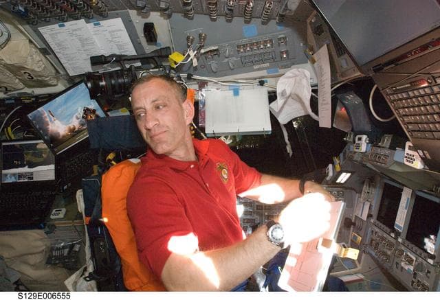 NASA image: STS-129 CDR Hobaugh works on the FD