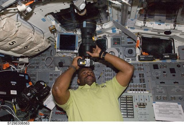 NASA image: STS-129 MS1 Melvin takes a photo through a FD Window