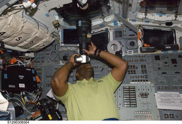 NASA image: STS-129 MS1 Melvin takes a photo through a FD Window