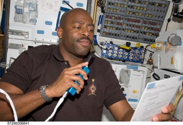 NASA image: STS-129 MS1 Melvin working on the Middeck