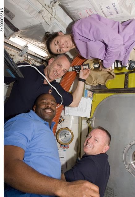 NASA image: View of Crew Members in the Airlock during STS-129/ Expedition 21 Joint Operations