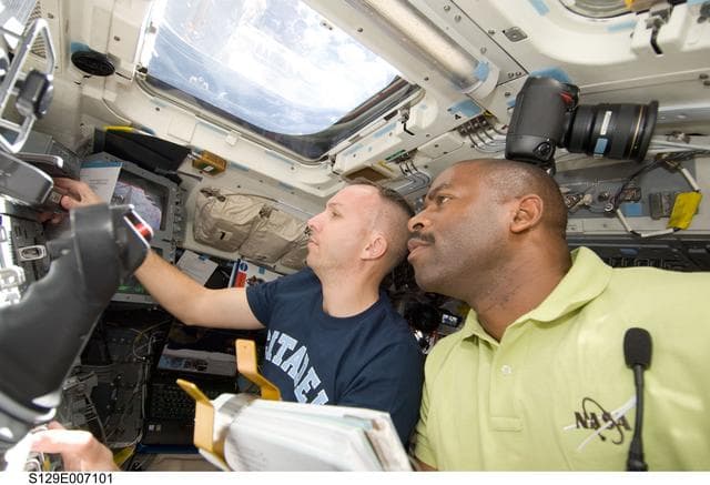 NASA image: STS-129 Crew Members transfer the ELC1 from the Payload Bay to the ISS