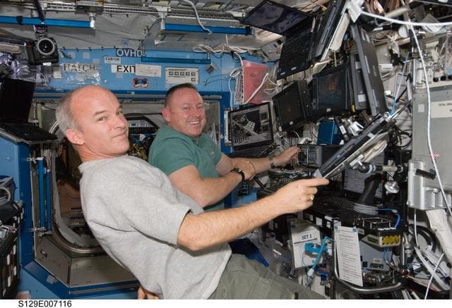 NASA image: STS-129/Expedition 21 Crew Members transfer the ELC1 from Atlantis to the ISS