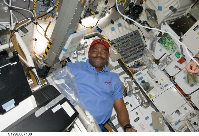 NASA image: STS-129 MS1 Melvin poses for a photo on the Middeck
