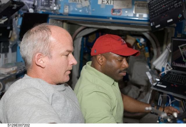 NASA image: STS-129/Expedition 21 Crew Members work to install the ELC2