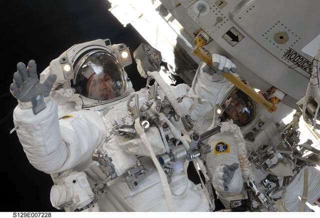 NASA image: View of STS-129 MS3 Foreman and MS2 Bresnik during EVA2