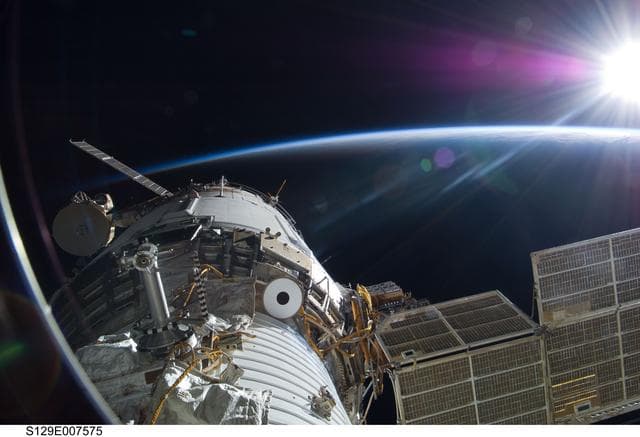 NASA image: Exterior view of the Service Module backdropped by Earth's Limb