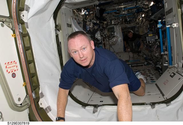 NASA image: View of STS-129 Pilot Wilmore posing for a photo on the ISS